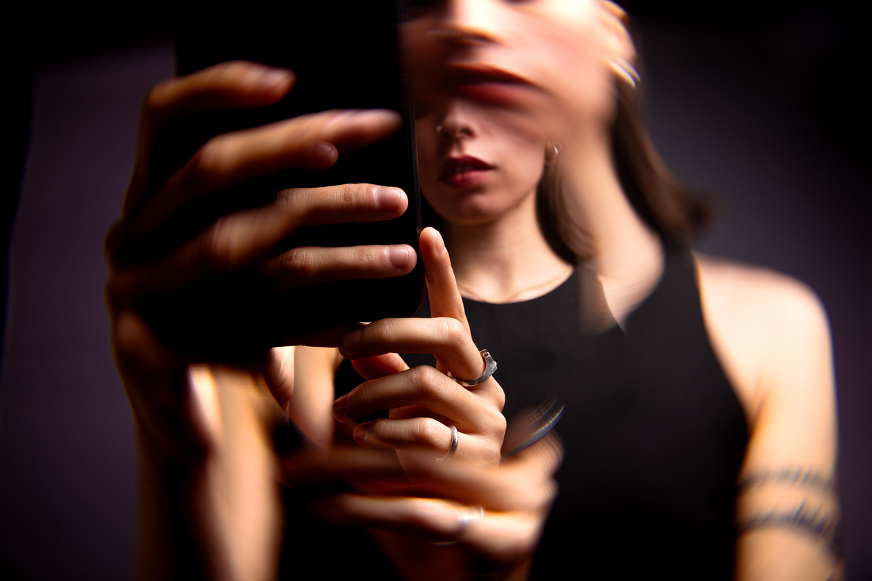 A blurry image of a woman, symbolising the overwhelming and intrusive thoughts that she experiences from her OCD.